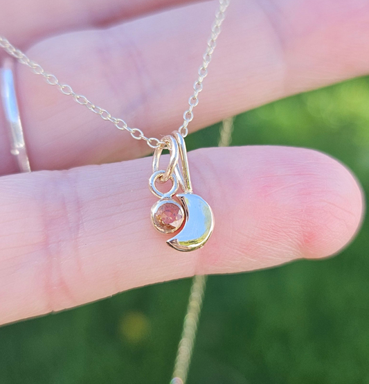 Moon and sapphire pendant
