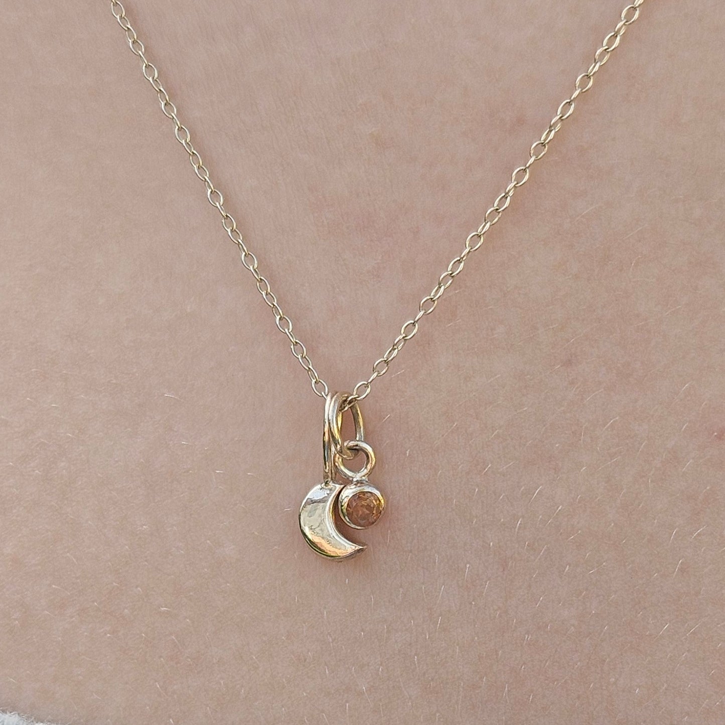 Moon and sapphire pendant