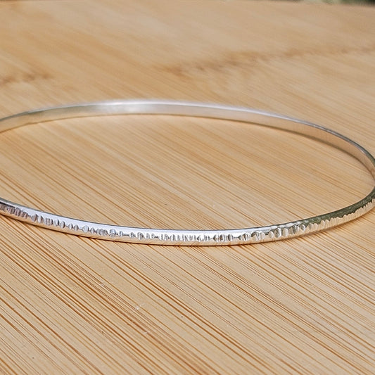 Sterling silver hammered bangle
