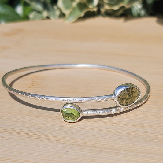 Sterling silver bangle with moldavite and peridot