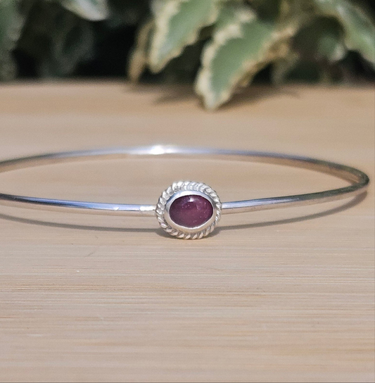 Sterling silver bangle with a tourmaline