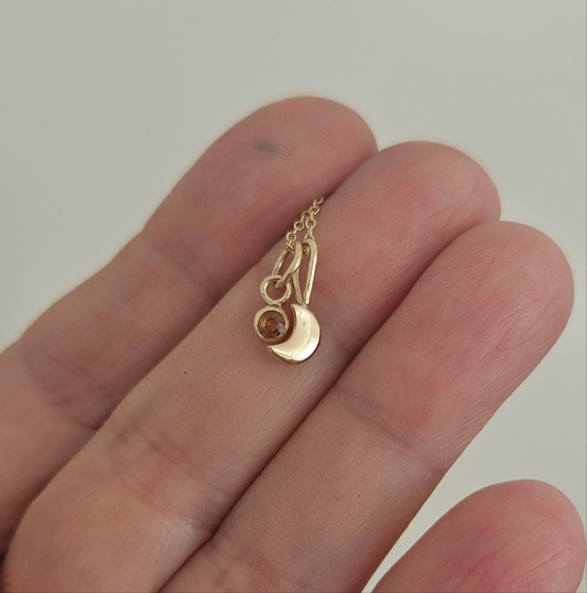 Moon and sapphire pendant
