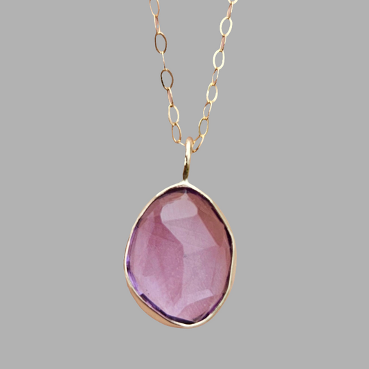 Amethyst 9ct gold pendant