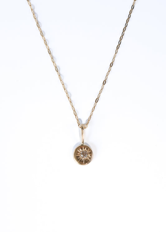 9ct gold organic shape pendant with diamond