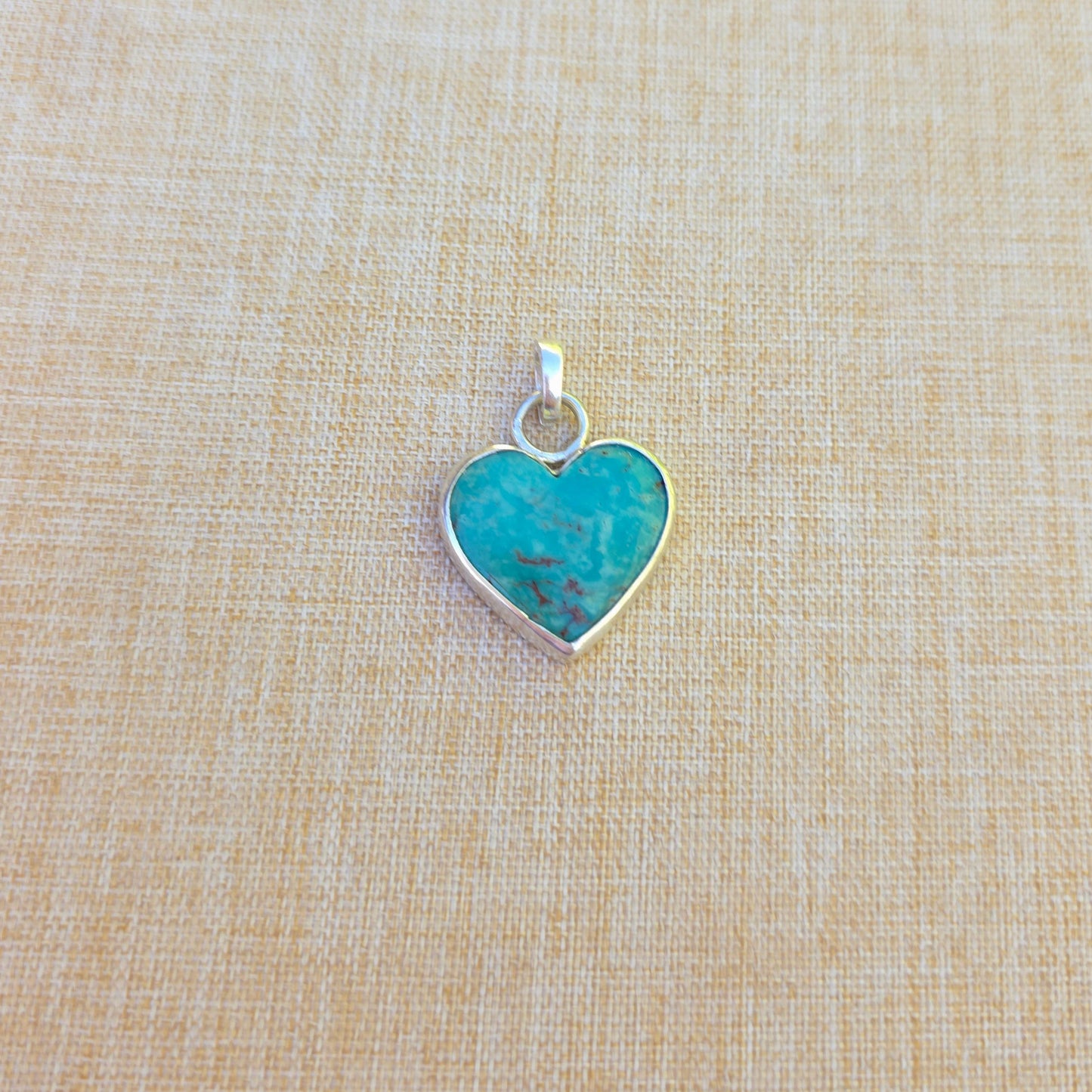 Turquoise heart in sterling silver
