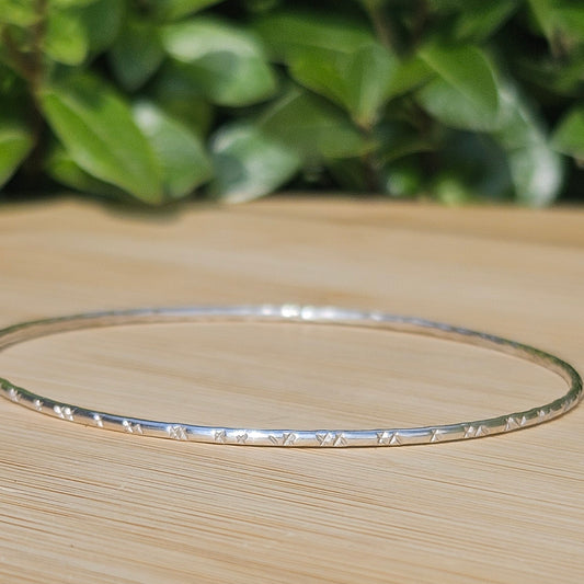 Sterling silver textured bangle