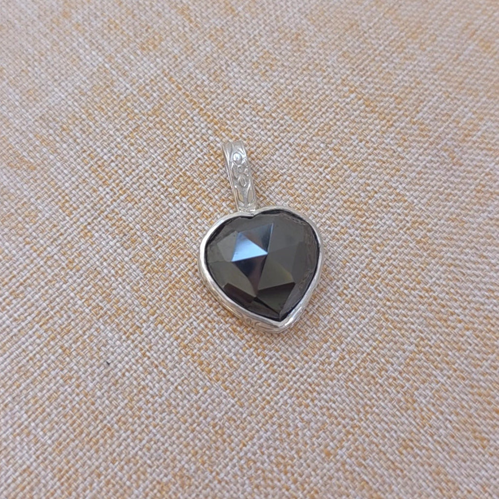 Black Hematite heart pendant in sterling silver.