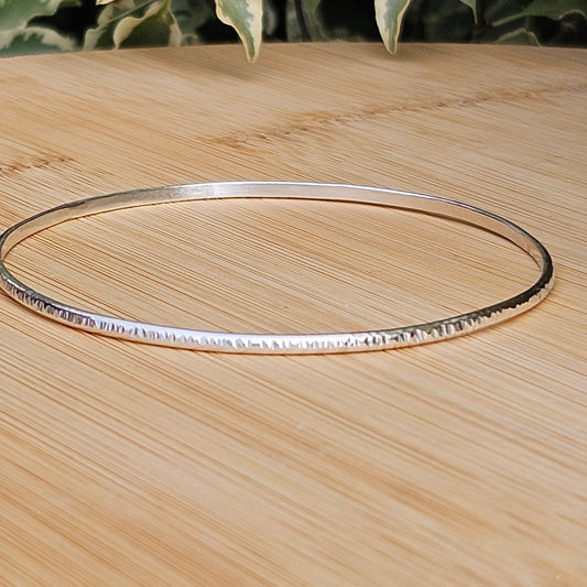 Sterling silver hammered bangle