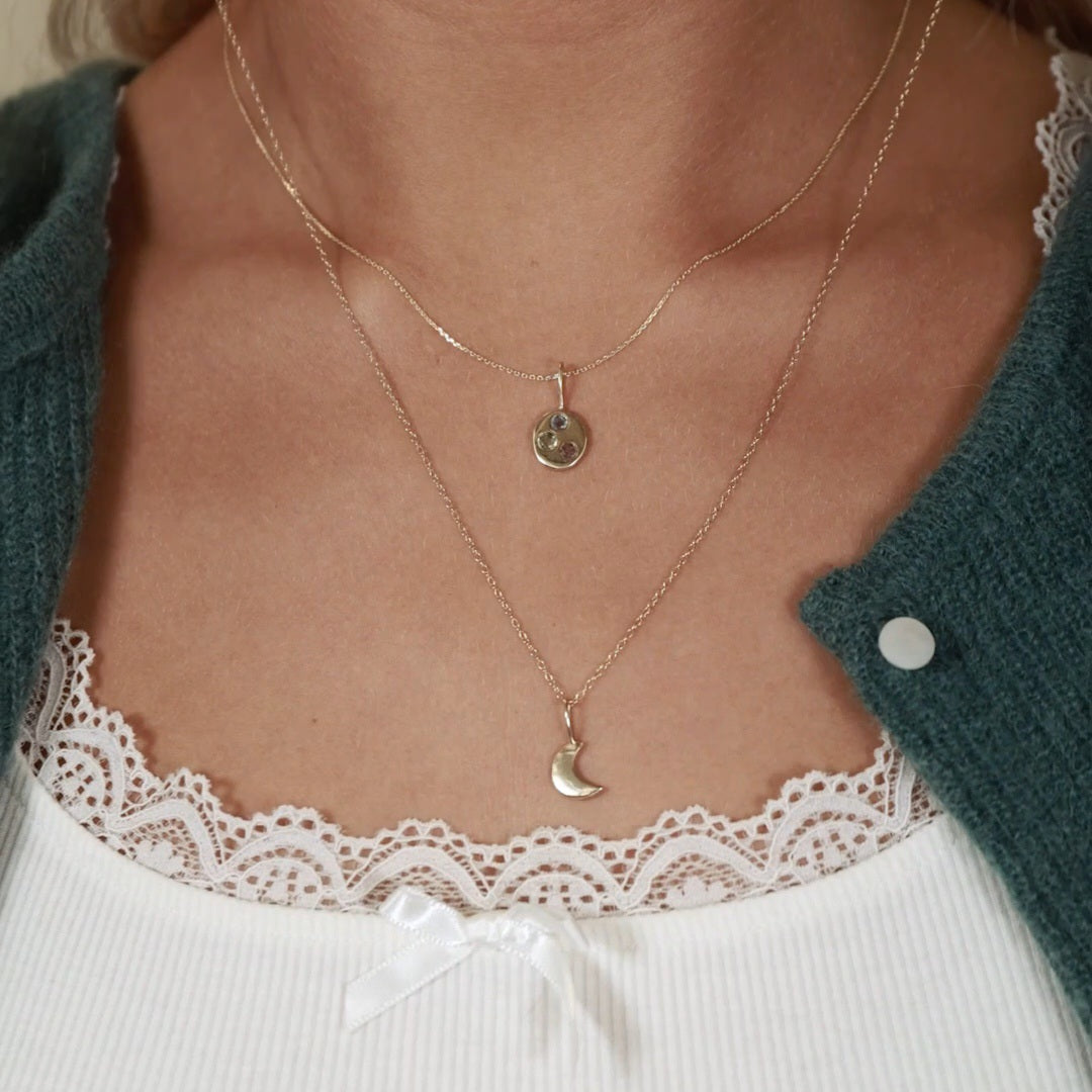 Gold moon pendant